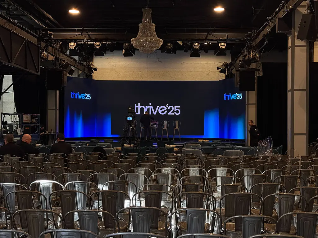 Professional event venue setup with stage and seating