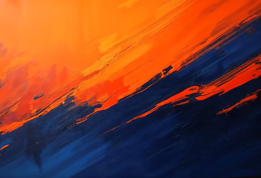 Abstract gradient painted texture with vibrant orange blending into deep blue streaks.