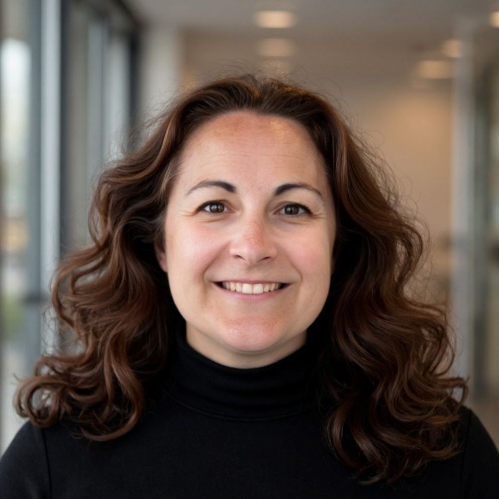Author headshot of Jill Casamento, workplace consultant and writer. Pictured in a black turtleneck with a softly blurred office background, she discusses the '97% Problem' and the decline of critical thinking in Australian workplaces.