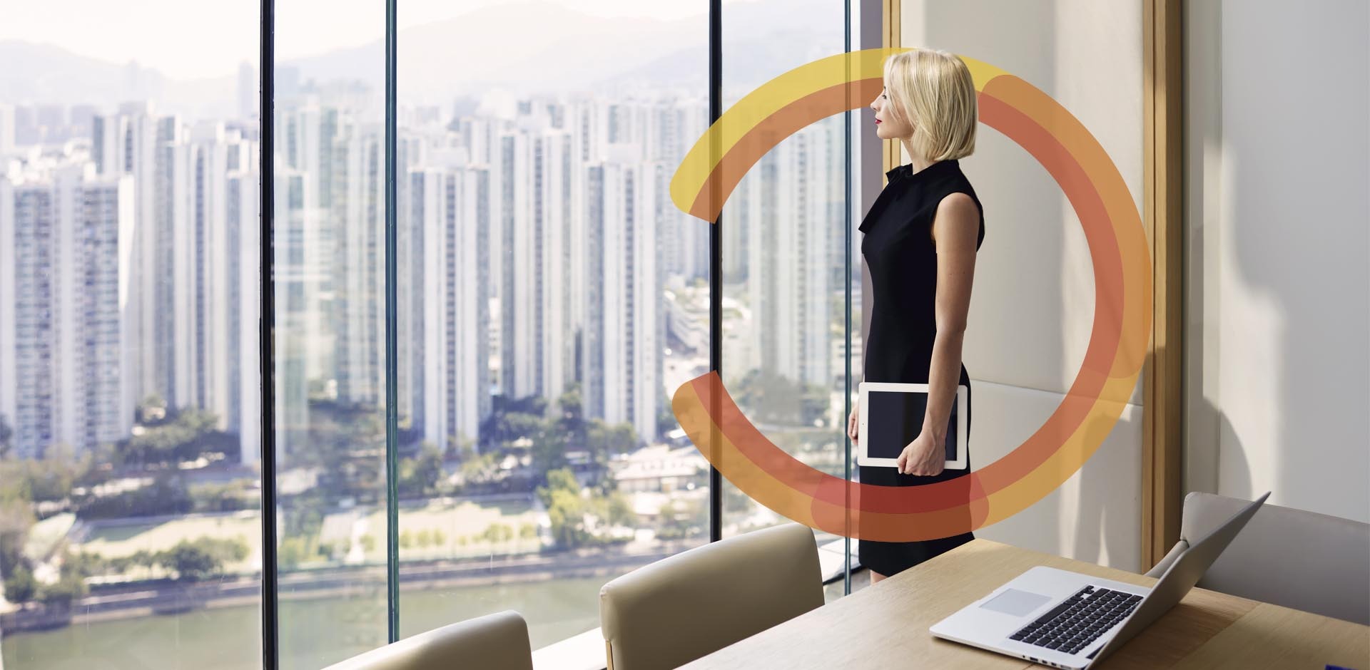 Businesswoman holding a tablet stands by a floor-to-ceiling window overlooking a city skyline, with a circular graphic overlay.