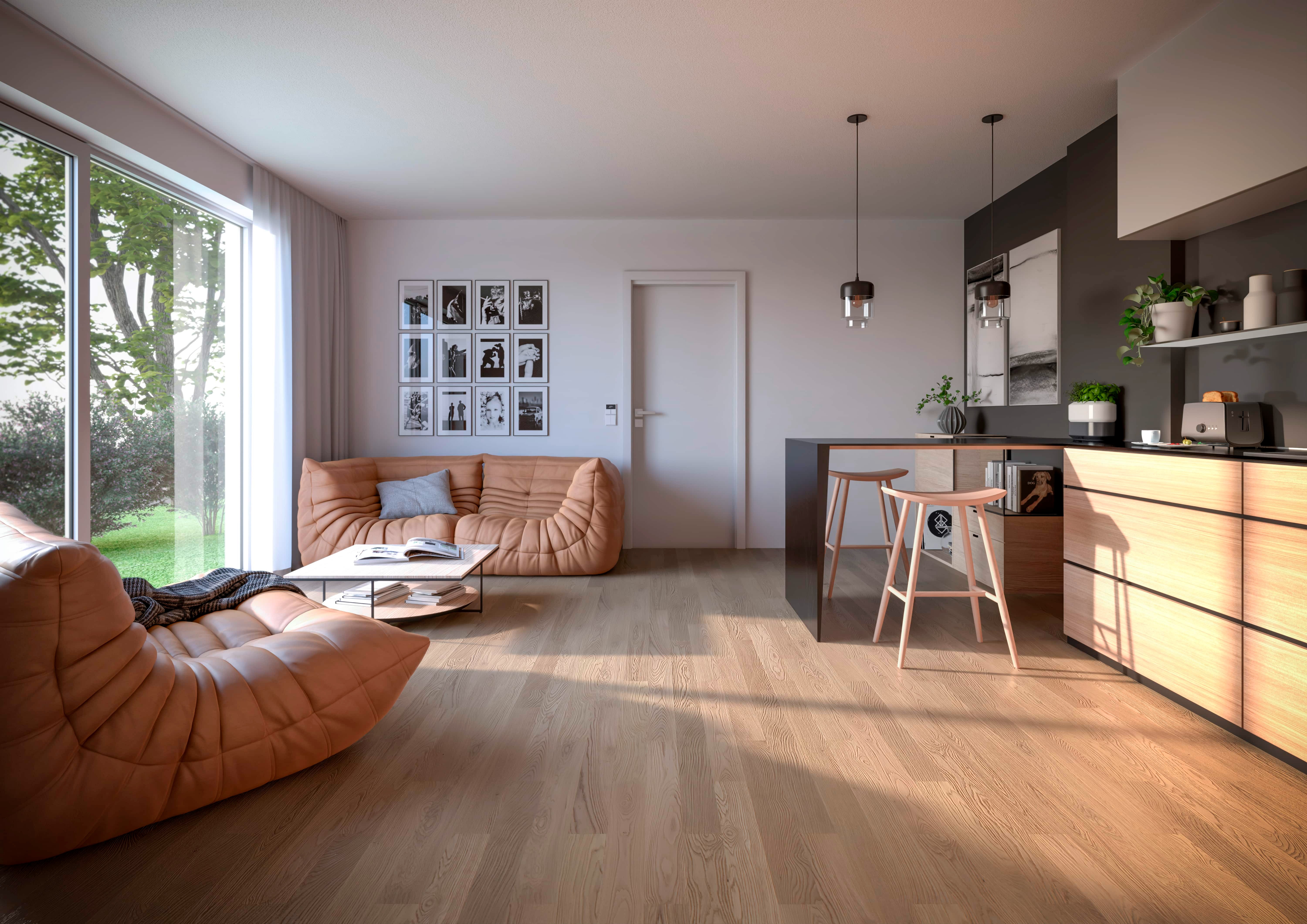 Modernes Wohnzimmer mit Sofa, Couchtisch und offener Küche mit Barhockern und Blick ins Grüne