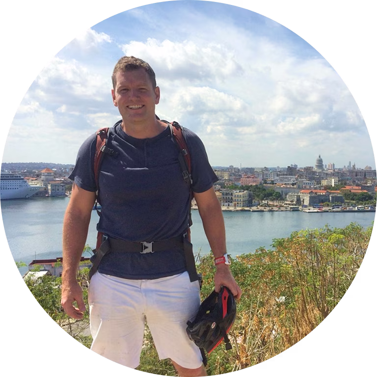 Tour founder by the water during a Revolutionary Story Tours experience.