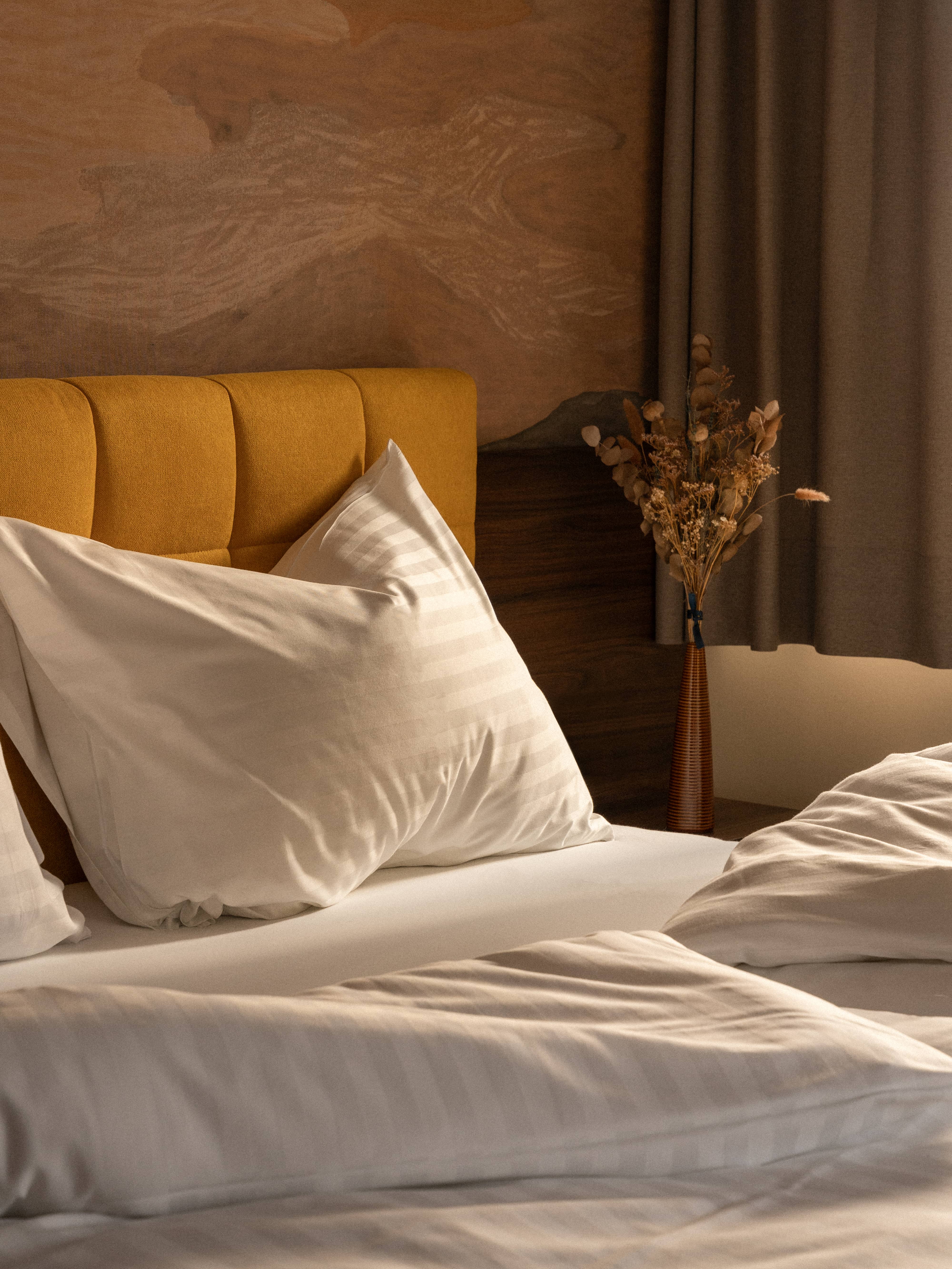 cozy boutique hotel bedroom with warm tones