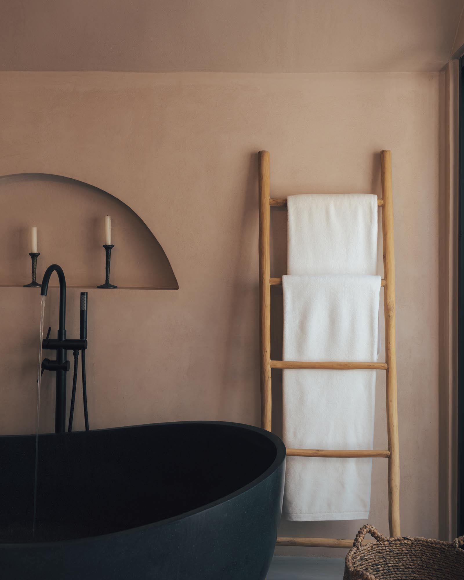 minimal luxury hotel bathroom interior with warm natural light