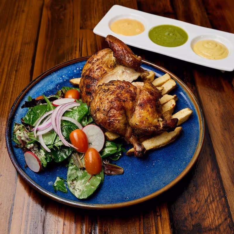 Mary's free-range rotisserie chicken, hand-cut French fries, green salad, creamy cilantro dressing.