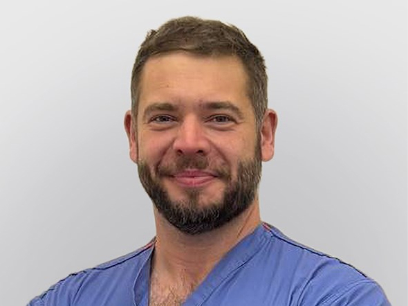 A portrait of Chris, looking approachable and friendly