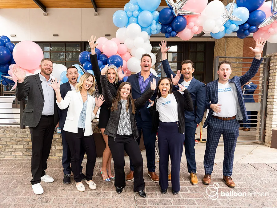 A balloon arch for a grand opening ribbon cutting ceremony for a brand launch.