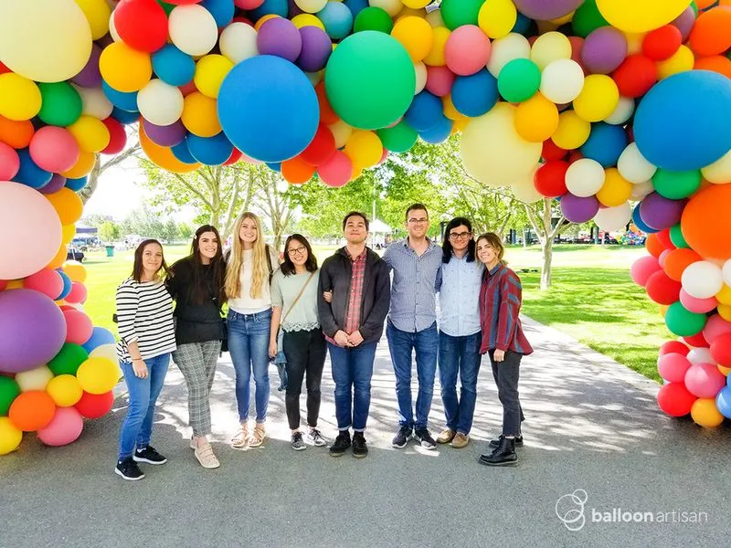 A balloon arch for a grand opening ribbon cutting ceremony for a brand launch.