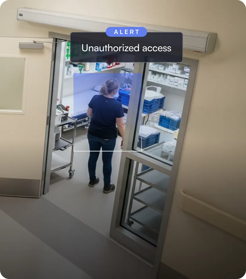 Person entering a medical storage room with an alert overlay saying Unauthorized access.