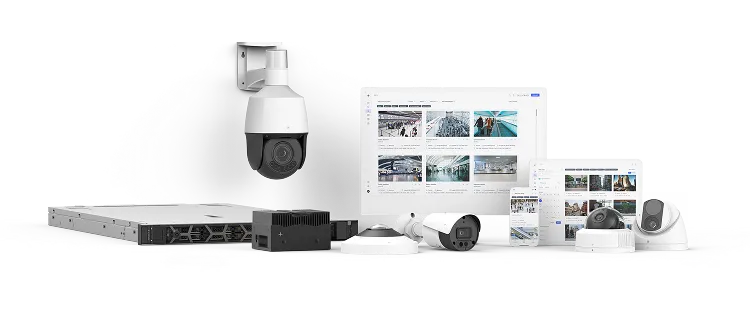 Assortment of security cameras, network hardware, and screens displaying surveillance footage and management software.