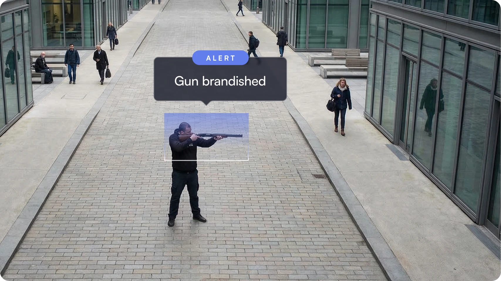 Man standing in an urban pedestrian area aiming a long firearm with an alert box above him reading 'Gun brandished.'