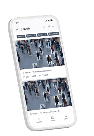 Smartphone screen showing surveillance footage search results with people identified in a crowded area.