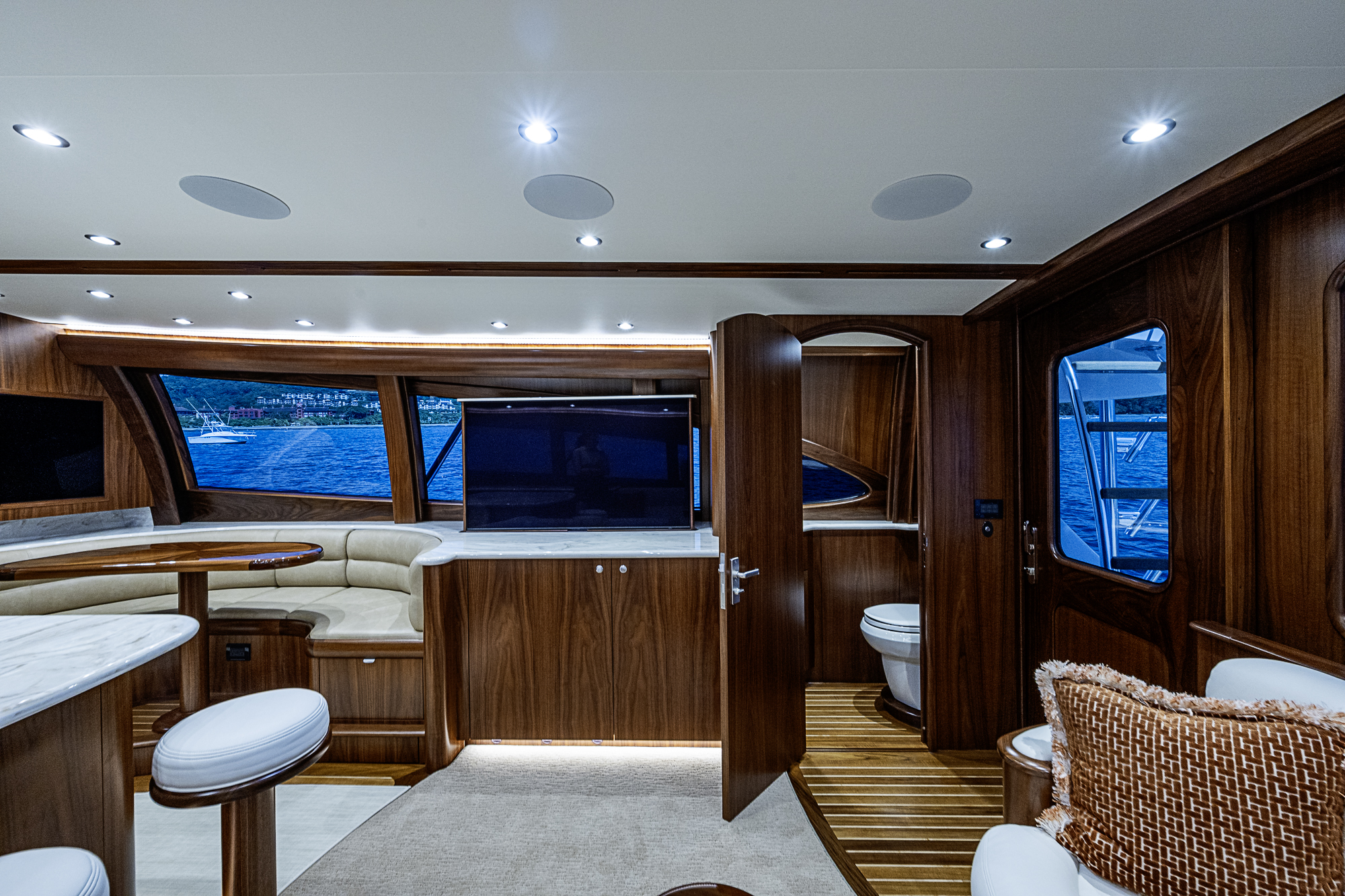 Custom fabricated acrylic marine dash panel with integrated glass cockpit layout planning.