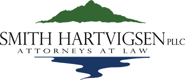 Smith Hartvigsen PLLC logo with a mountain and water reflection illustration and the tagline Attorneys at Law.