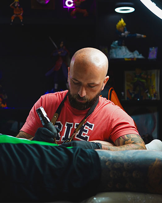 image of tattoo artist at work