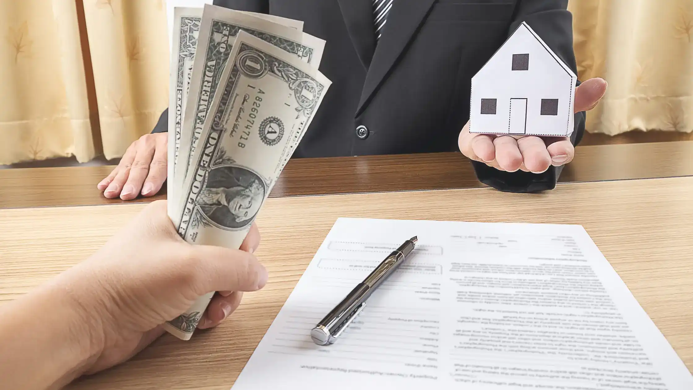 Two people discussing a home loan.