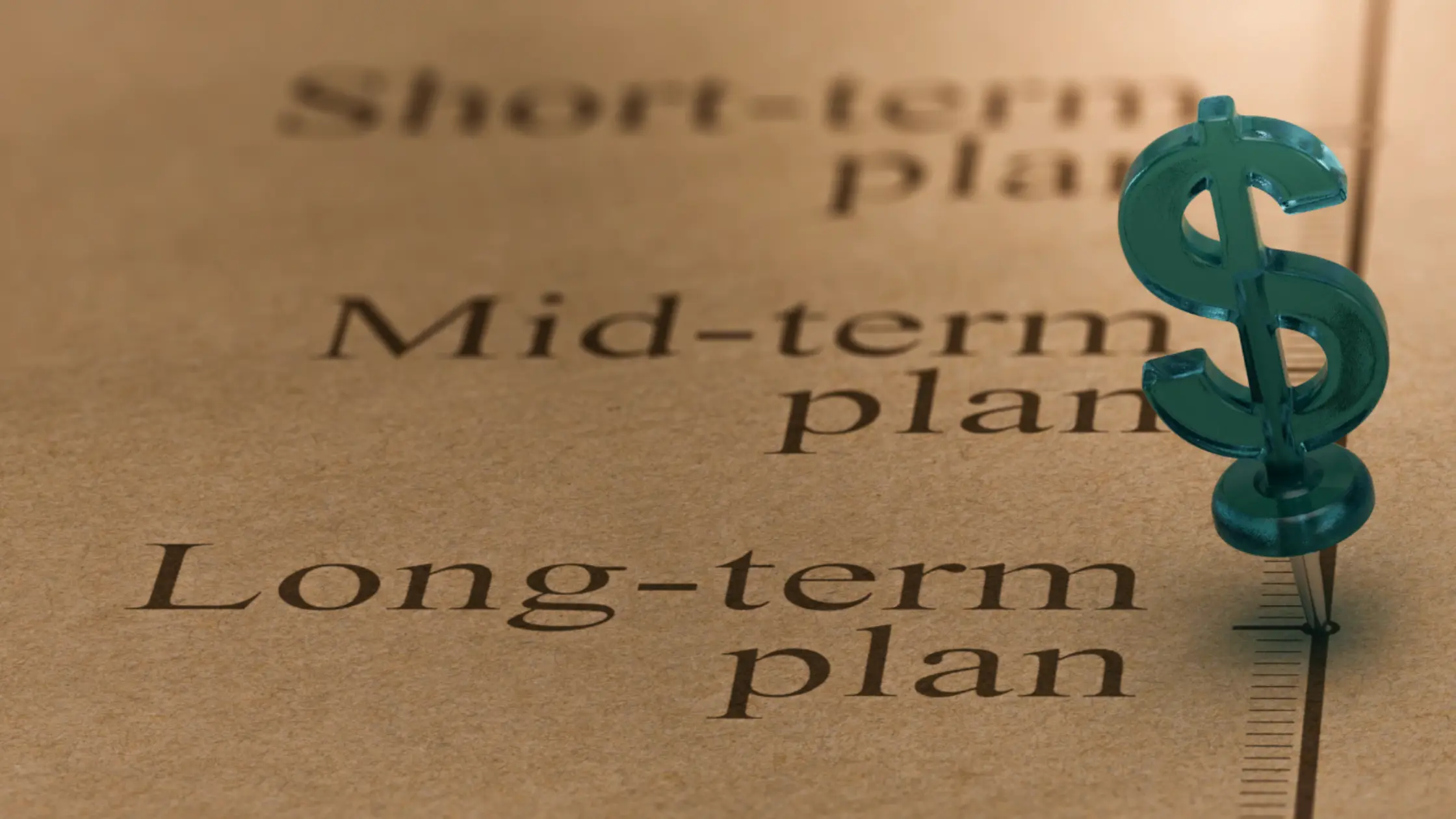 A dollar sign pin marking a list of different loan terms on paper, specifically highlighting