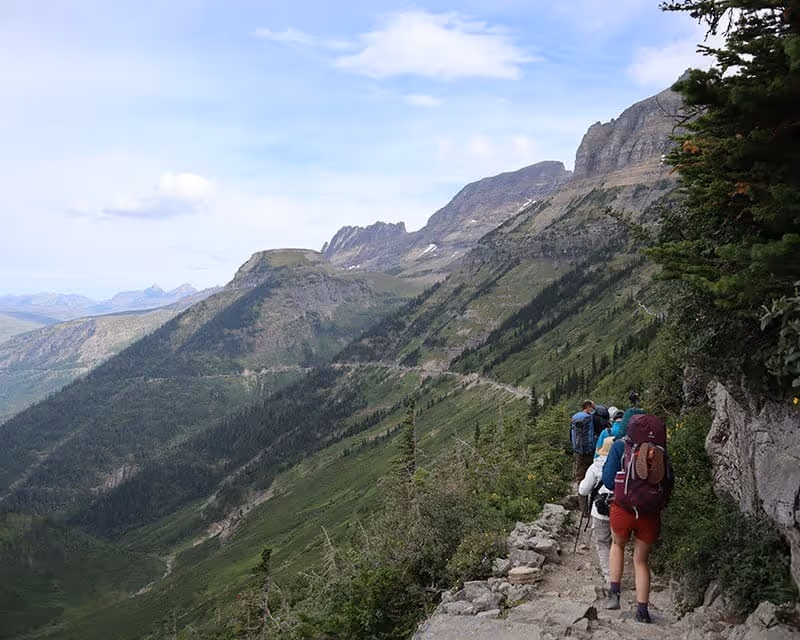 Hikers enjoying the view in Glacier National Park