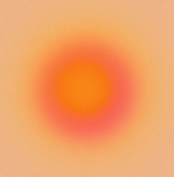 Blurred circular gradient with orange center fading into red and peach background.