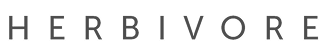 The word 'HERBIVORE' in bold uppercase letters on a white background.