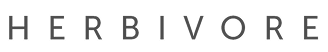The word 'HERBIVORE' in bold uppercase letters on a white background.