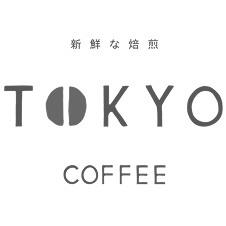 Logo with stylized text 'TOKYO COFFEE' featuring a coffee bean shape in place of the letter 'O' and Japanese characters above.