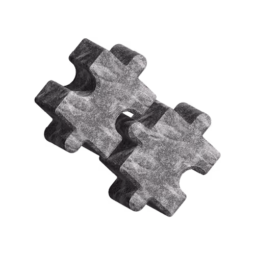 Two interlocking dark gray puzzle pieces with a textured stone-like surface on a black background.