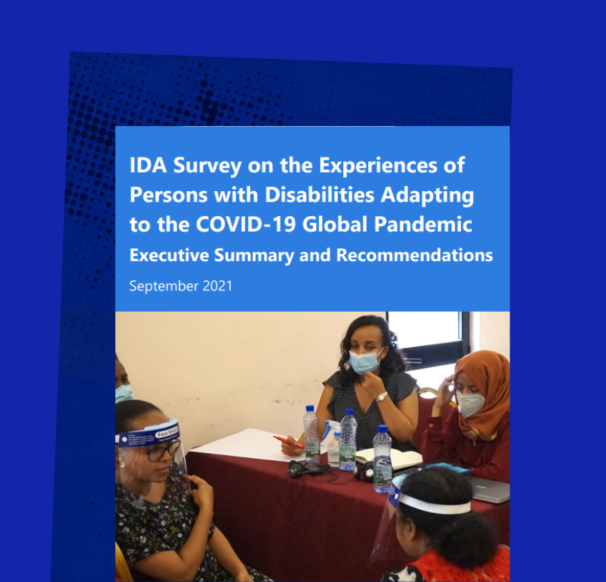 IDA survey on the experiences of persons with Ddsabilities adapting to the COVID-19 global pandemic. Executive summary and recommendations. A group of people with disabilities wearing masks