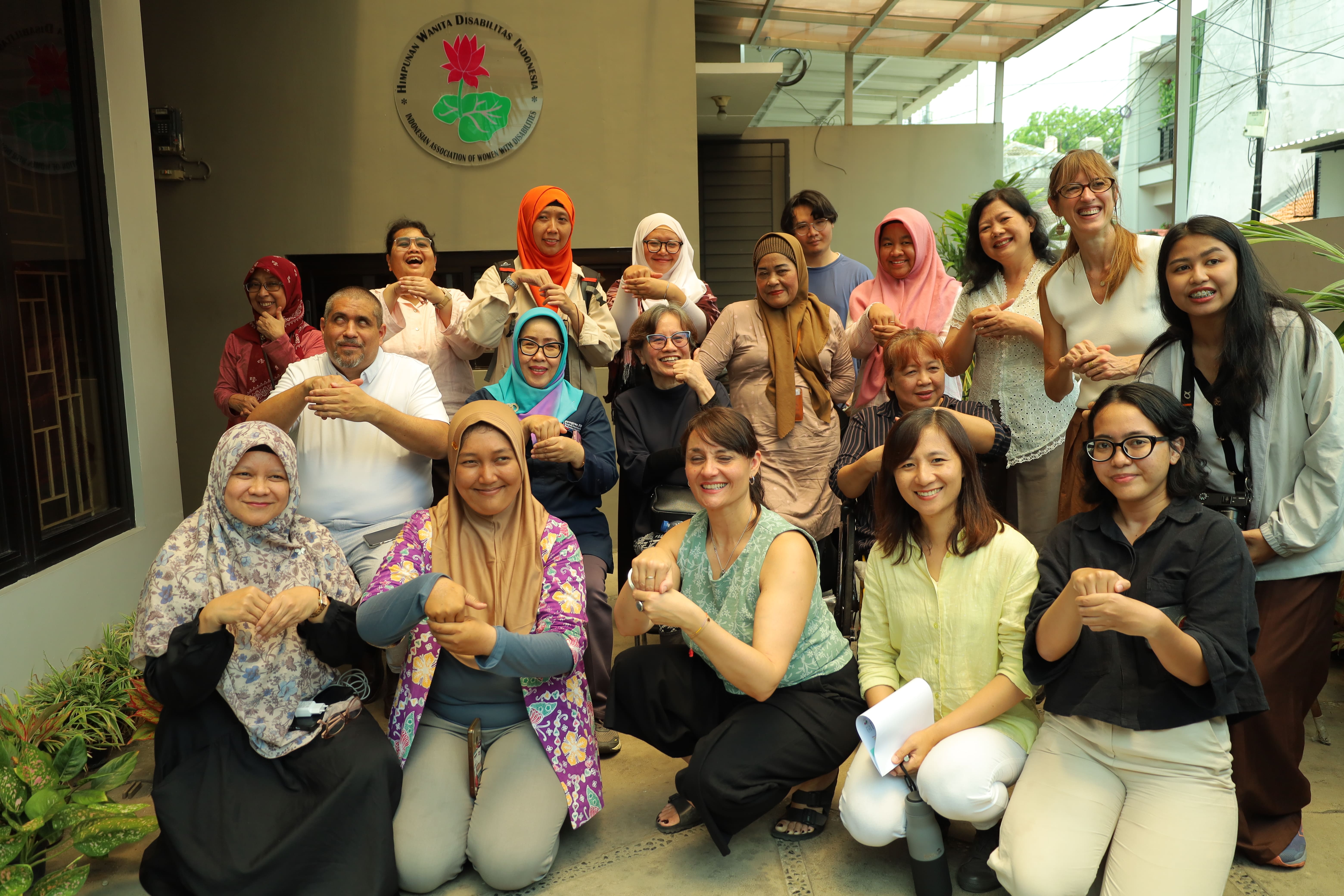 A group of Indonesian women with disabilities and José María Viera in a group photo