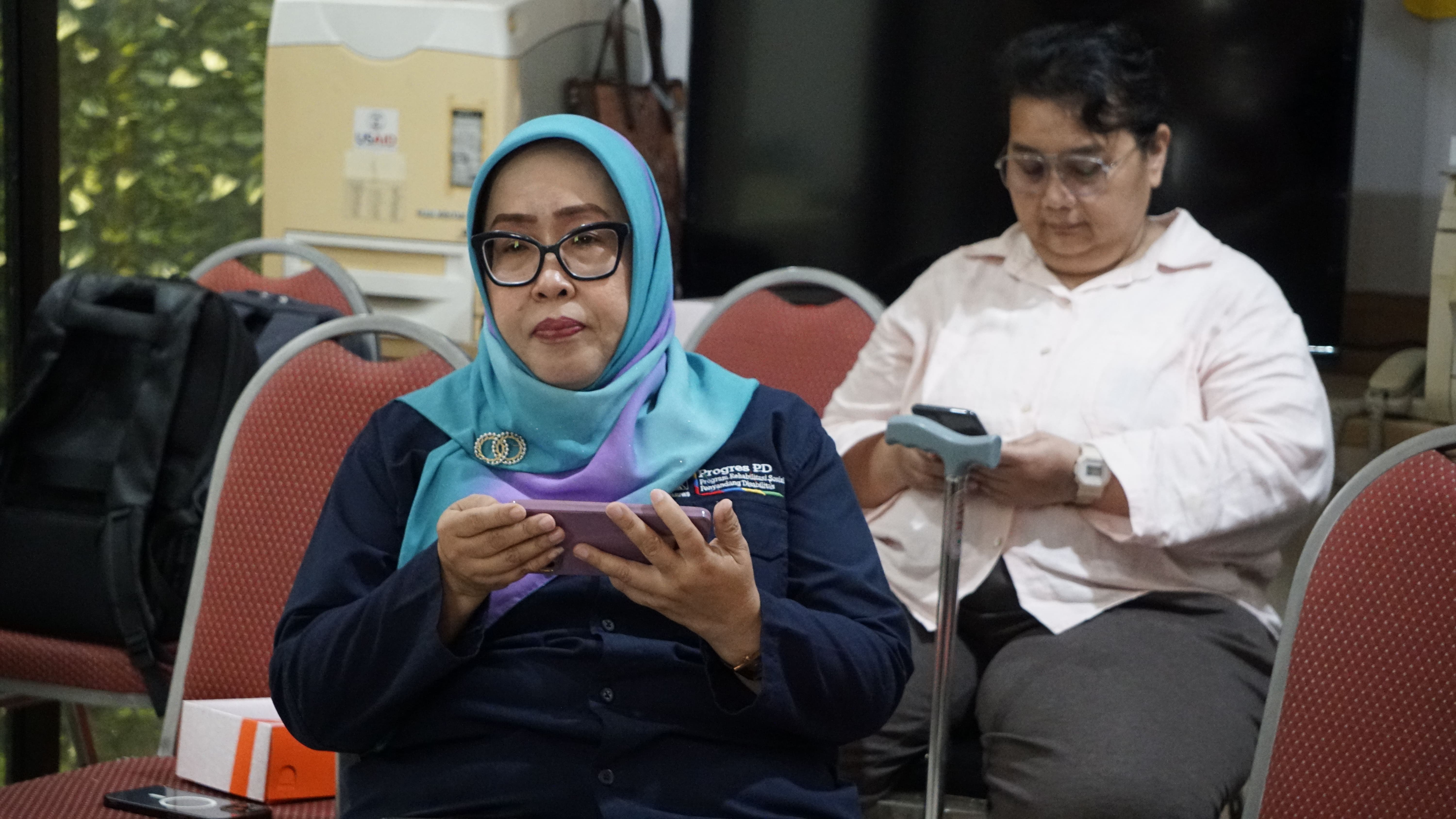 Two Indonesian women with disabilities in their OPD
