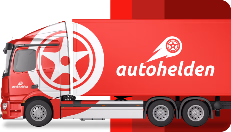 Red truck with large white stylized wheel graphic and the word 'autohelden' on the side.