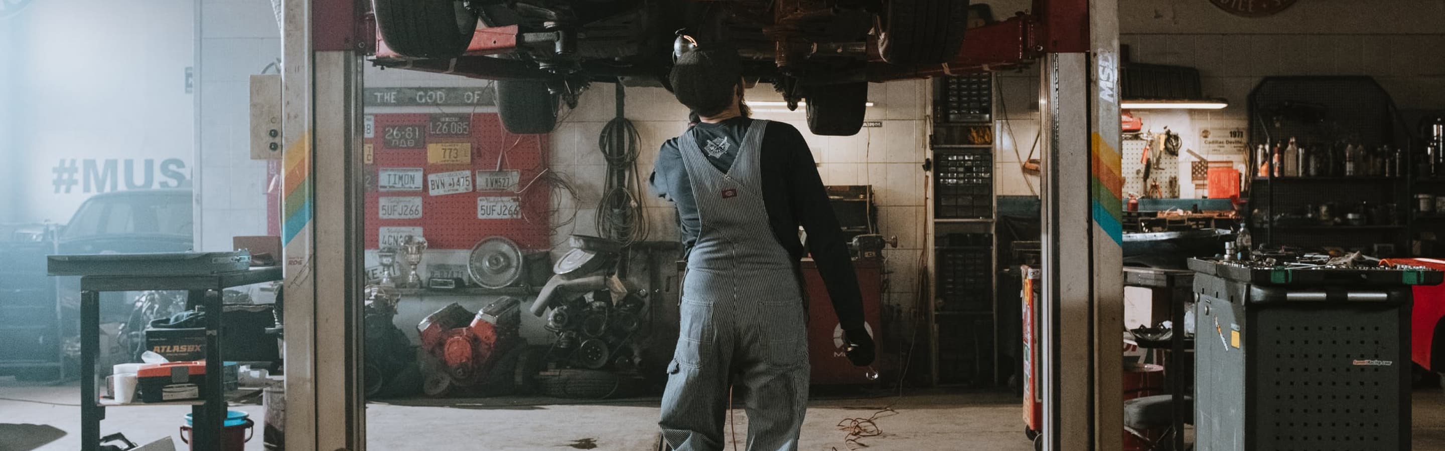 Man standing in service station 