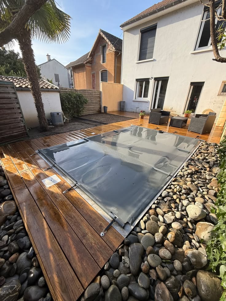 Photographie de réalisation de piscine et terrasse bois en Dordogne