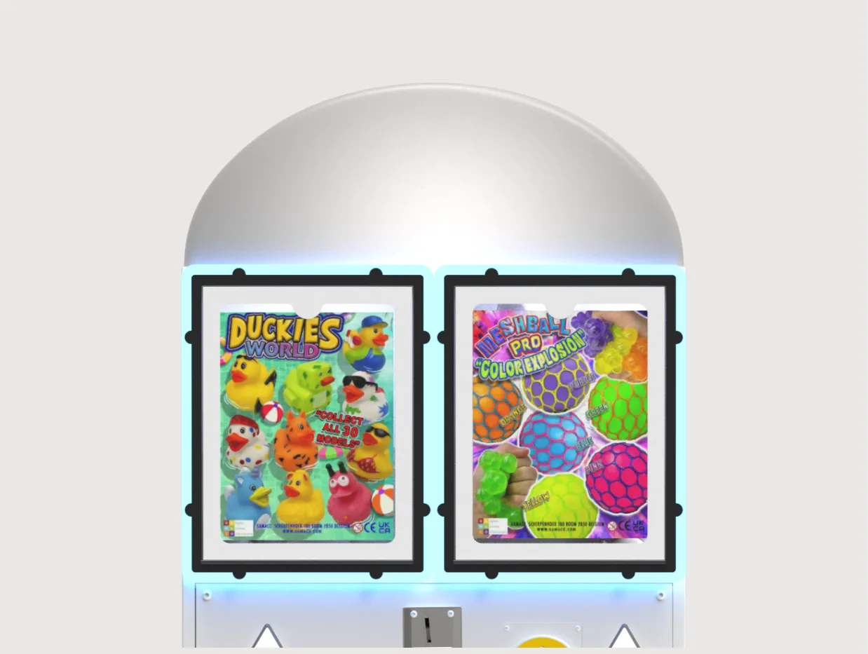 Two colorful toy vending machine displays: one advertising Duckies World rubber ducks, the other Meshball Pro Color Explosion squeeze toys.