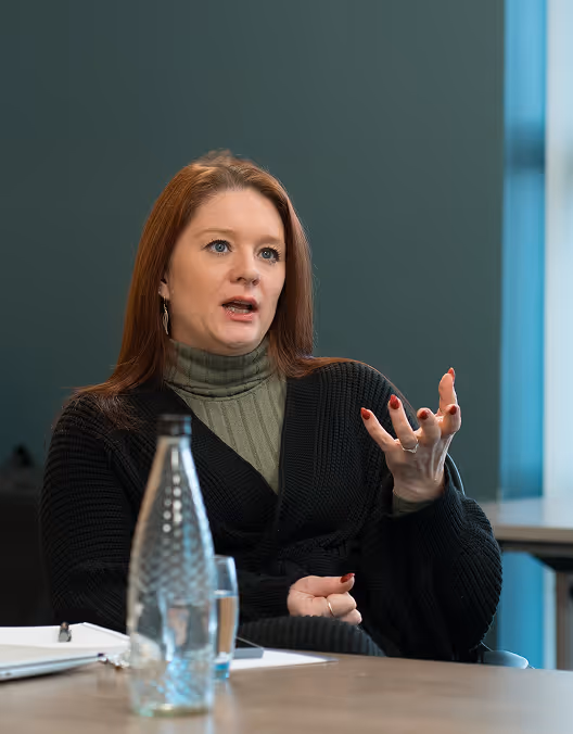 Person speaking at Business Mastermind Group