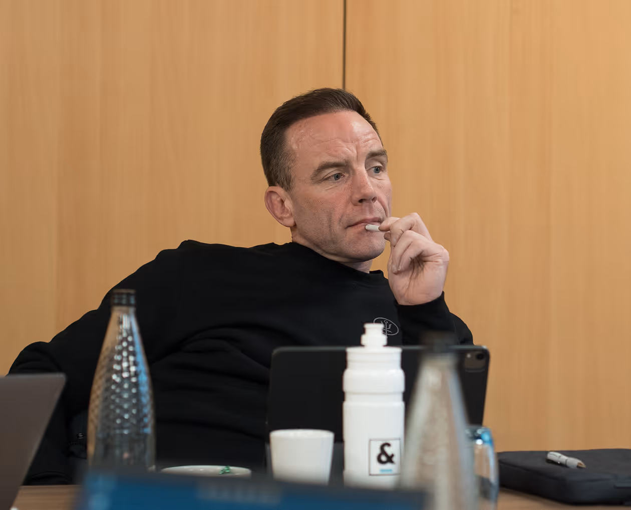 Person in business mastermind meeting