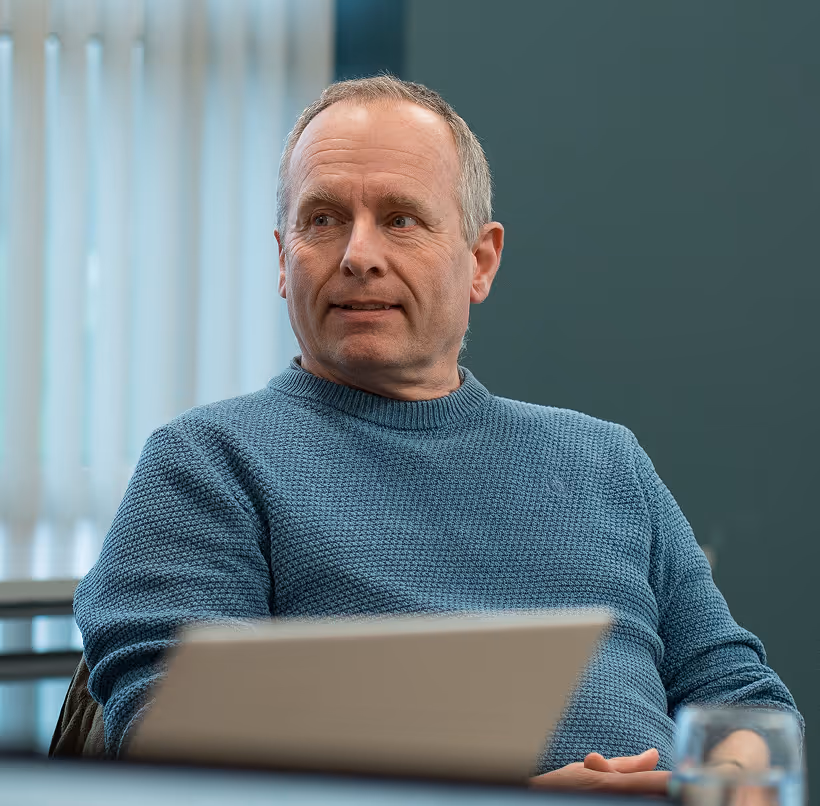 Person in business mastermind group session