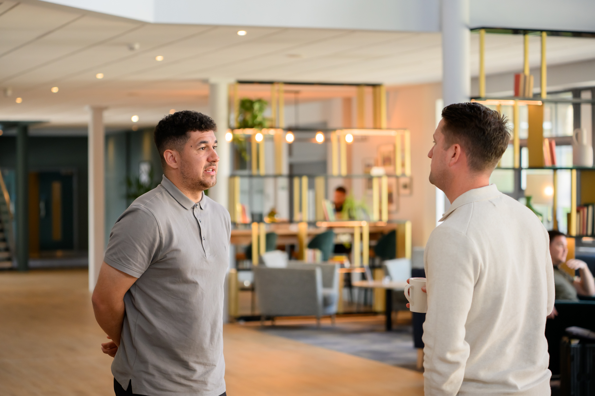 phpt showing two business owners chatting during business mastermind group