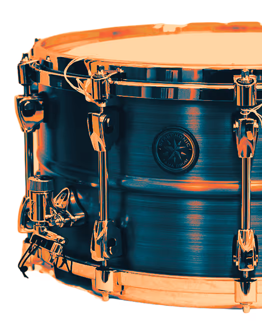 Close-up of a blue metallic snare drum with chrome hardware and tuning lugs.