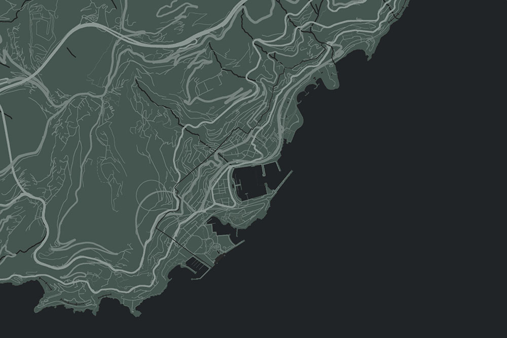 Dark-themed topographic map showing road networks and coastline of Monaco.