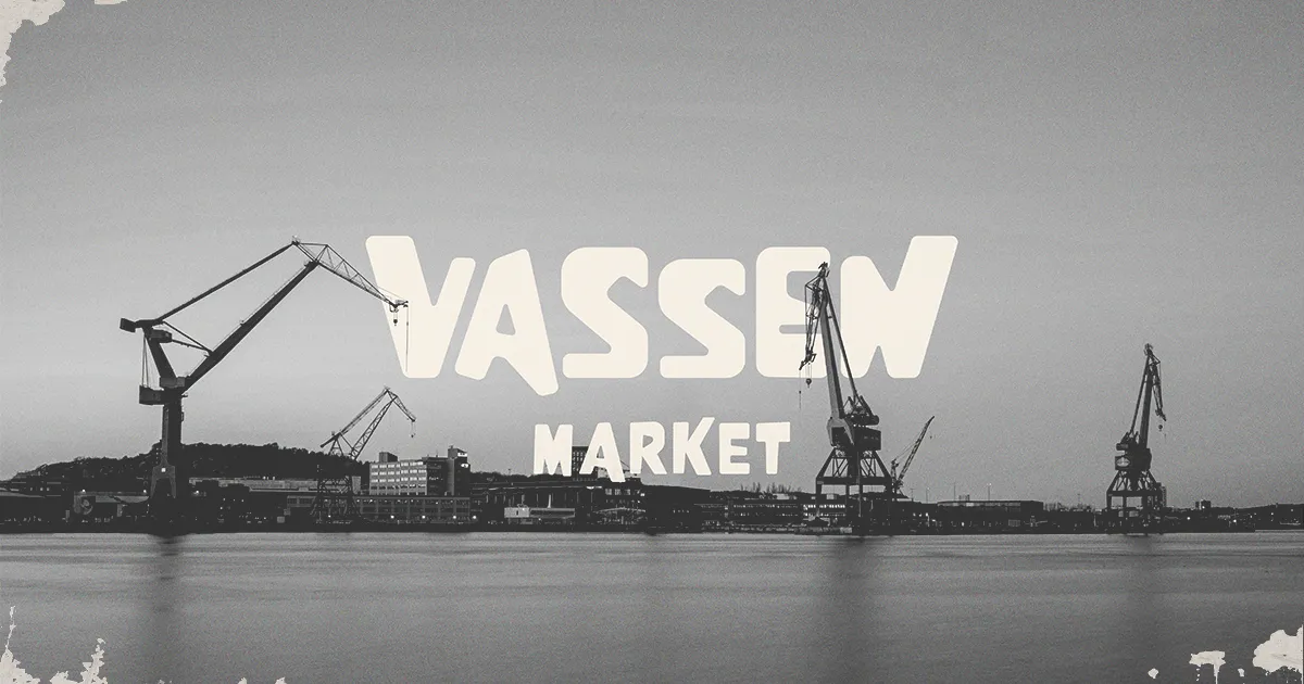 Black and white harbor scene with large cranes and buildings, with Vassen Market text overlay.