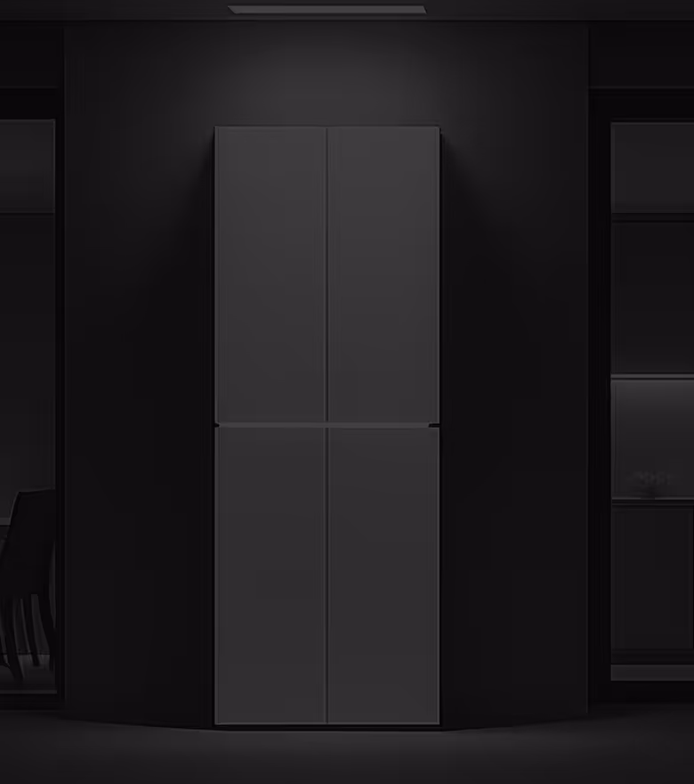 Modern power station with a sleek design, positioned between dark glass windows showing a dining area on the left and a kitchen on the right.