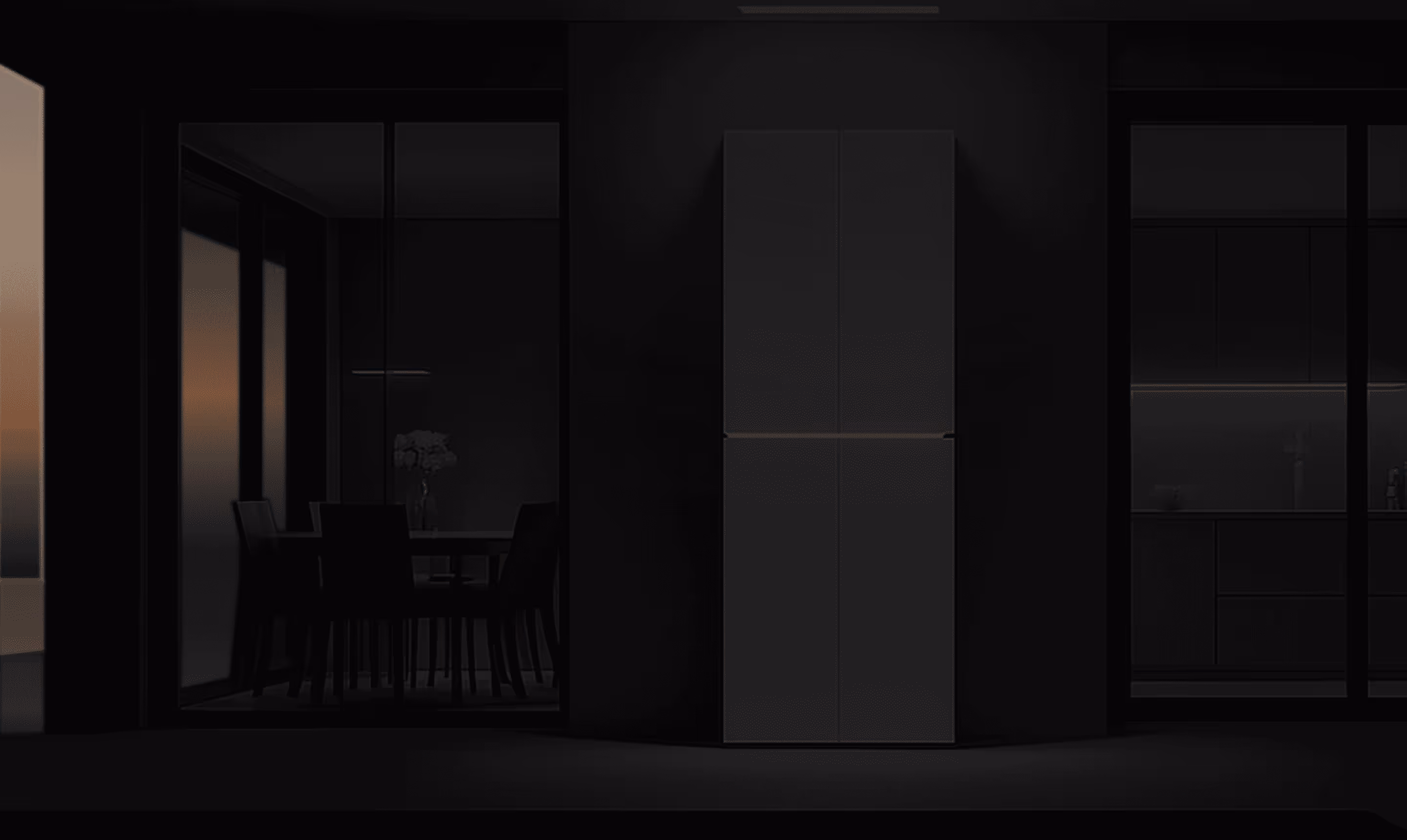 Modern power station with a sleek design, positioned between dark glass windows showing a dining area on the left and a kitchen on the right.