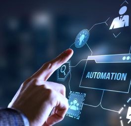 Hand reaching toward glowing automation button on futuristic digital interface