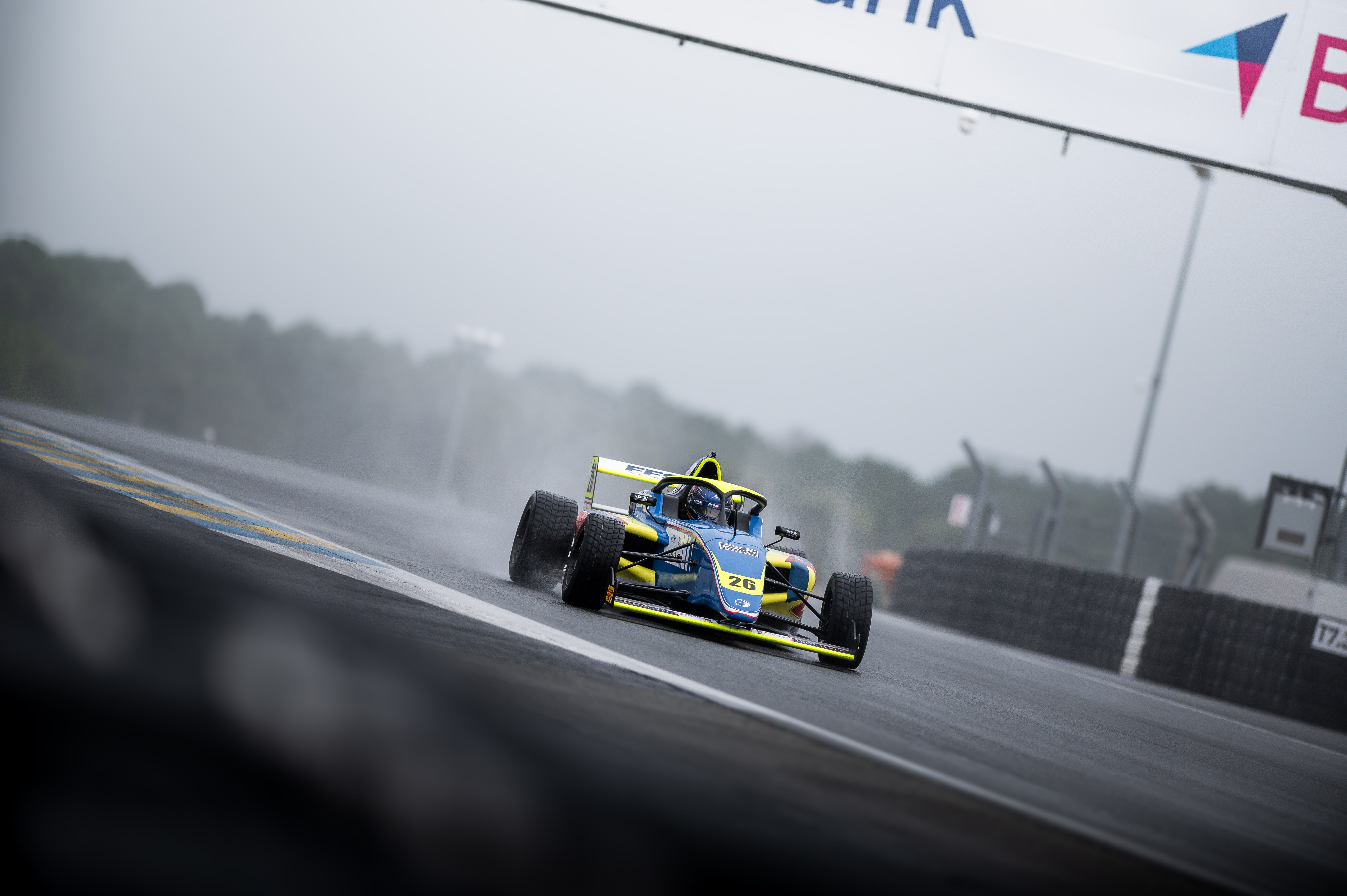 Rayan Caretti racing in the rain in Le Mans in F4 
