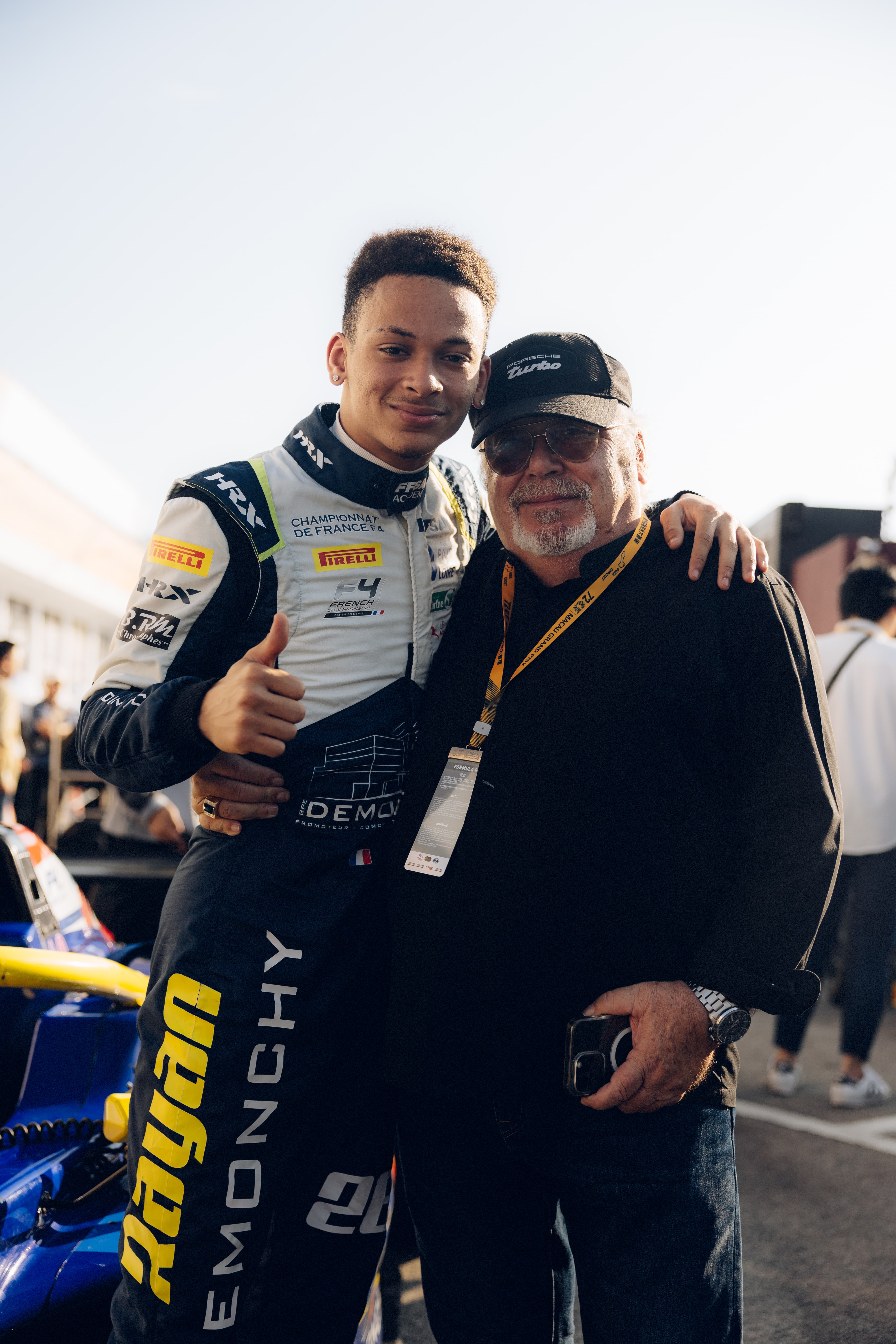 Rayan Caretti with his dad in Macao 