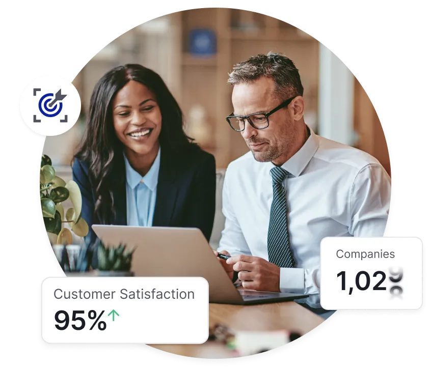 Two business professionals, a woman and a man, reviewing data on a laptop in an office setting with customer satisfaction at 95% and company count displayed.