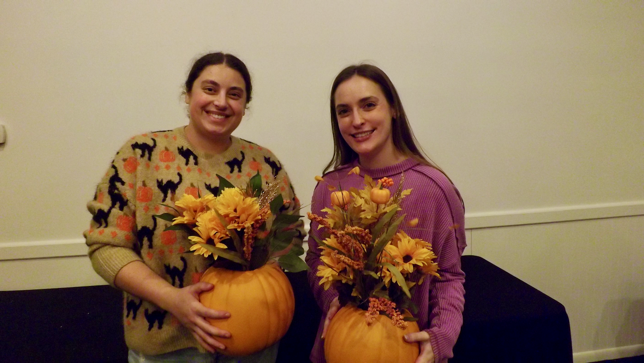 image of parents and staff discussing enrollment
