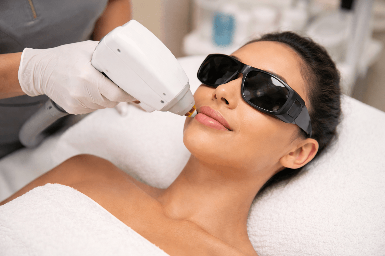 woman receiving professional facial hair removal treatment in Chandler Arizona