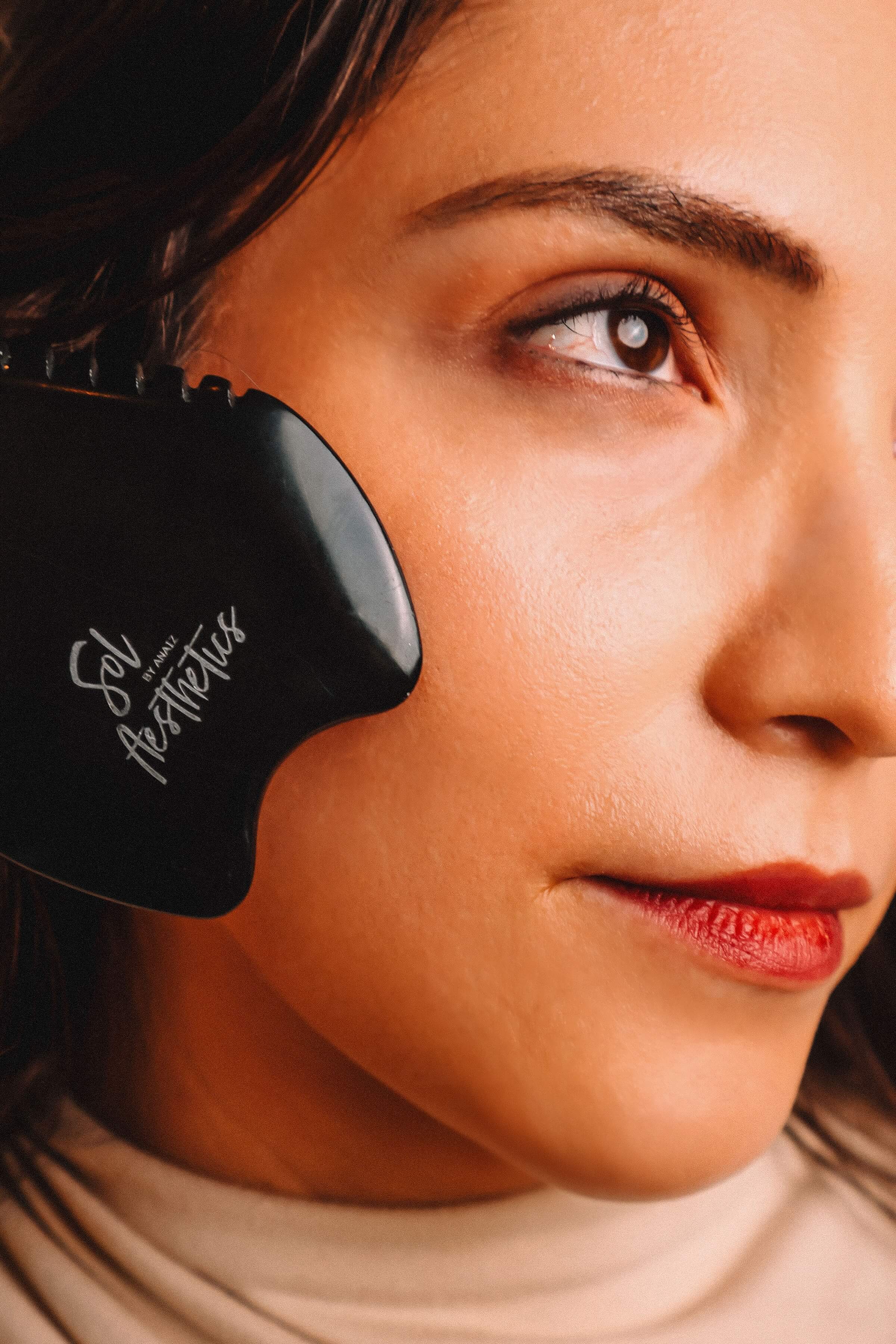 Facial ritual treatment at Sol Aesthetics in Chandler, AZ featuring gua sha and lymphatic detox